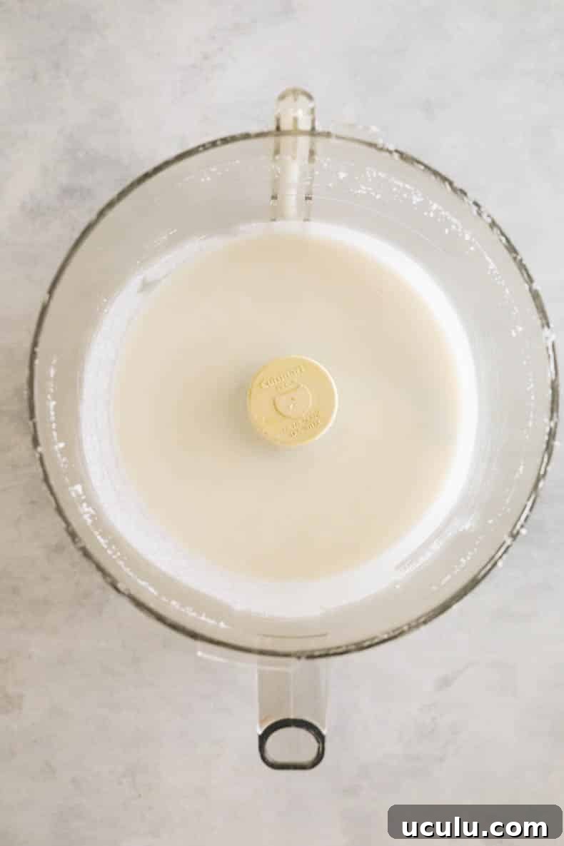 processed coconut butter in a food processor
