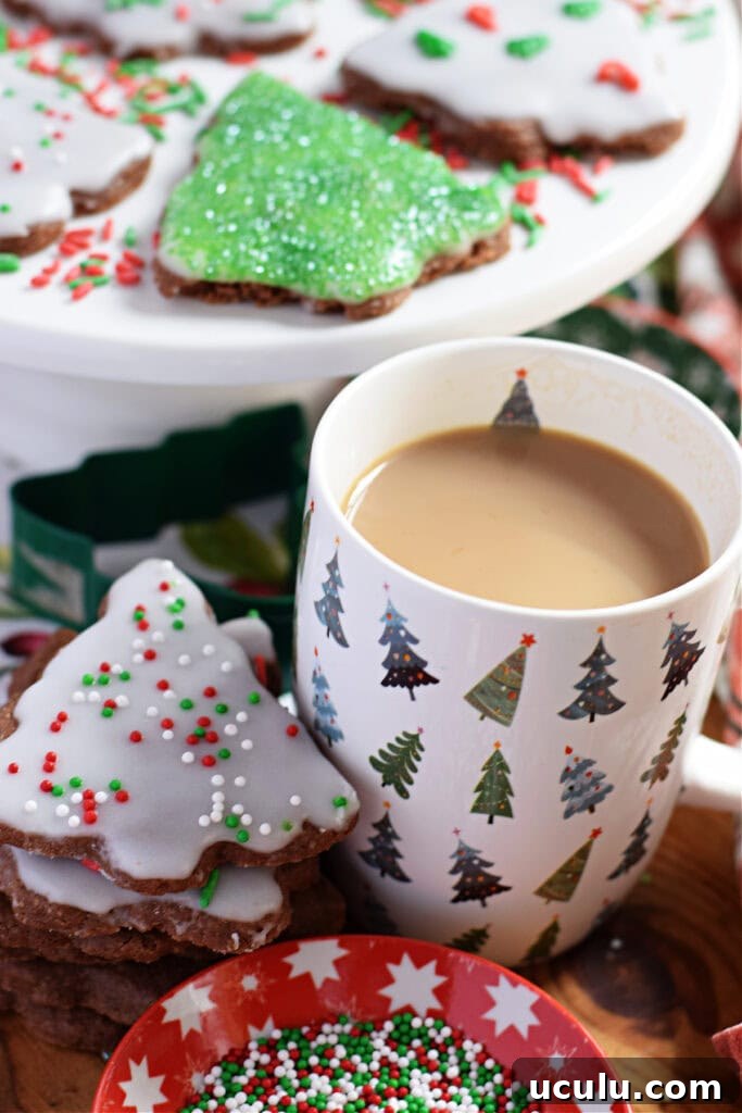 Christmas tree shortbread cookies with a cup of coffee.