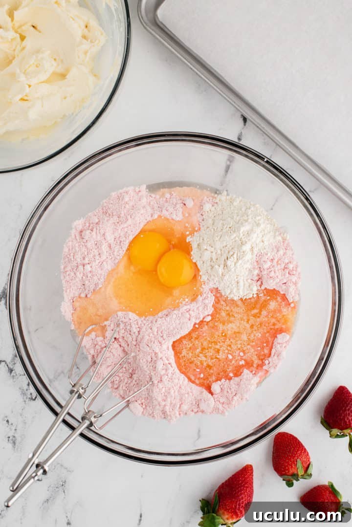Eggs, cake mix, flour and butter in a bowl.