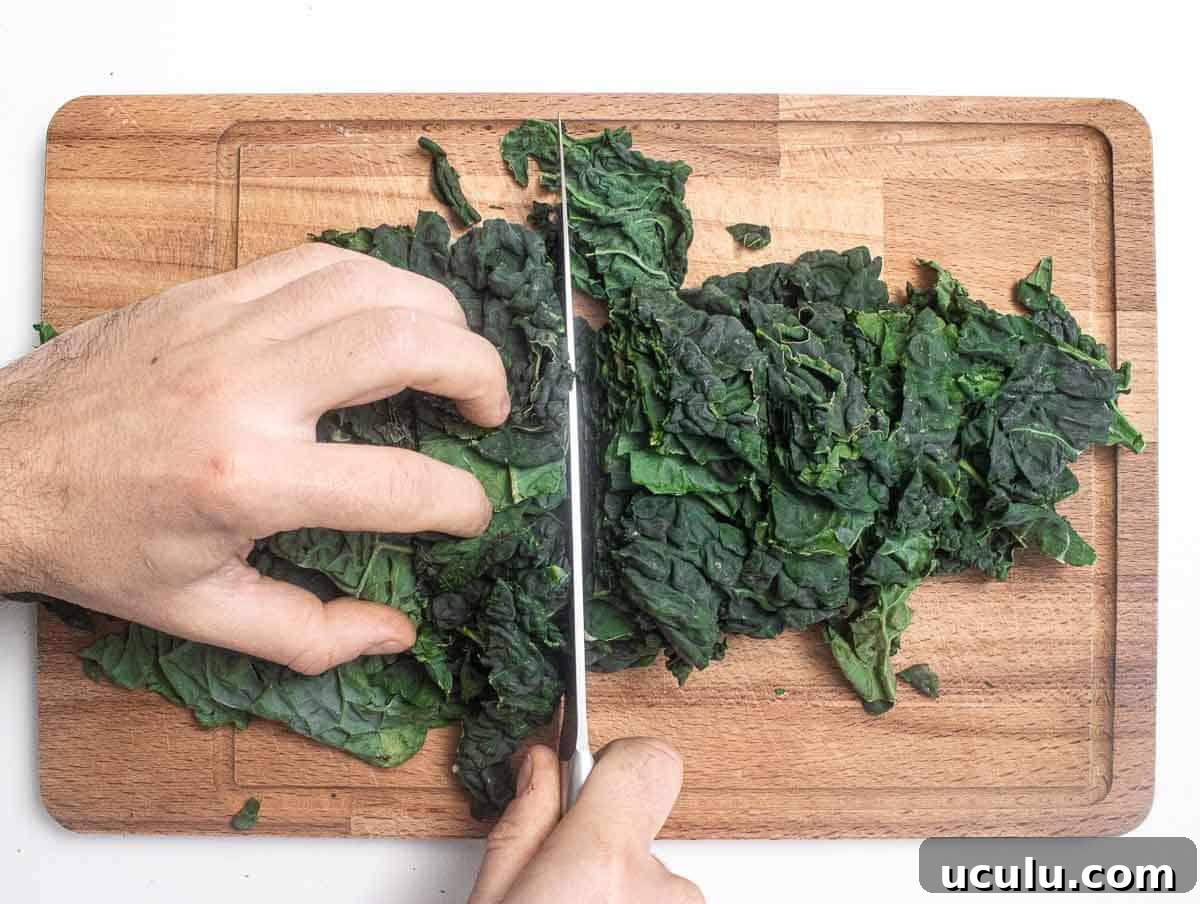 chopping the kale leaves