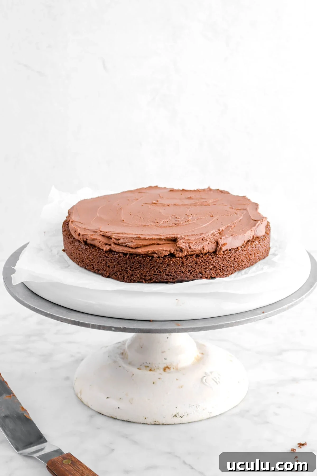 frosting spread on top of cake layer