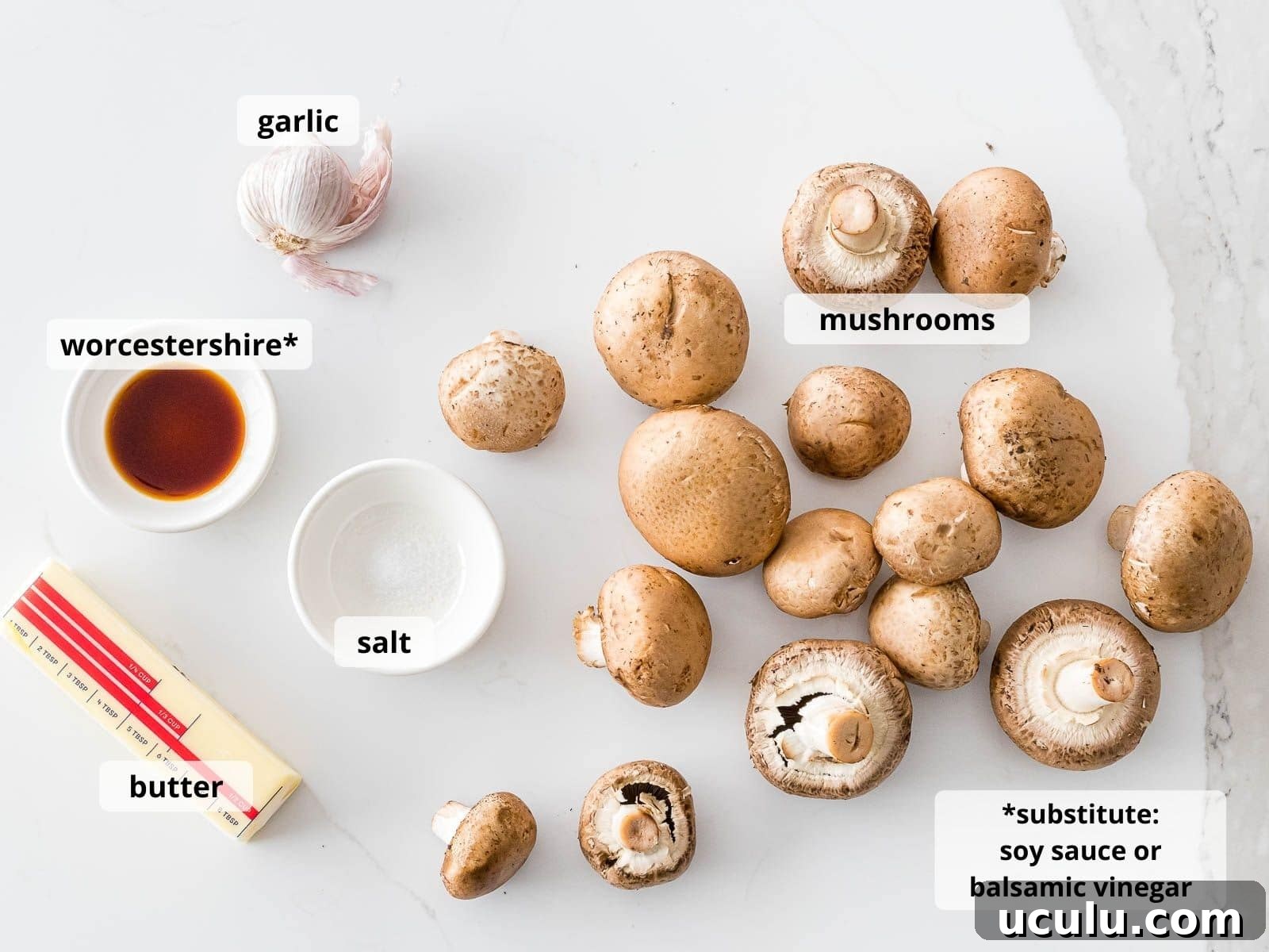 ingredients for garlic butter mushrooms with text labeling each ingredient