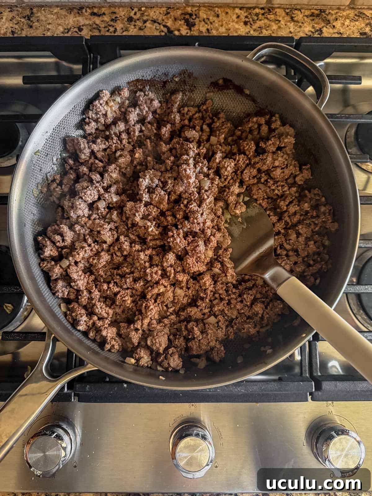 ground beef and onion browned in a skillet.