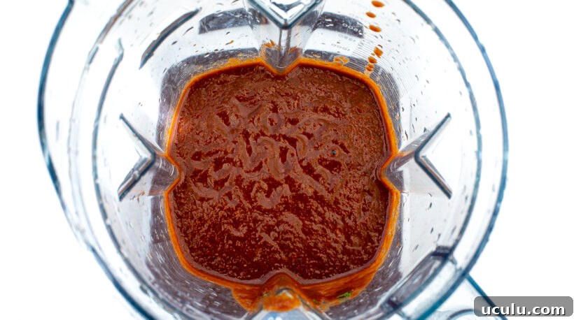 Roasted Tomato Chili Salsa blended up in a blender.