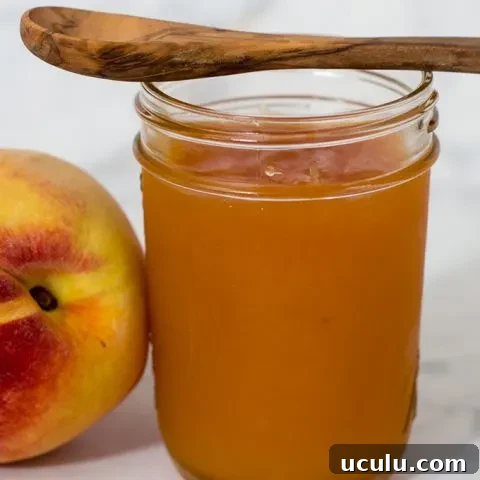 Peach butter is smoother and less sweet than peach preserves, resulting in a purer peach flavor. Canning peach butter preserves the flavor all year long. #SundaySupper