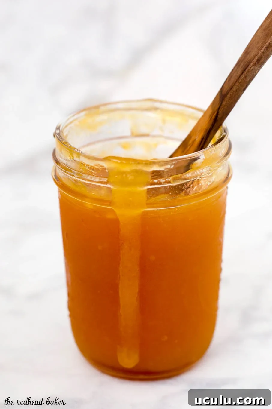 Peach butter is smoother and less sweet than peach preserves, resulting in a purer peach flavor. Canning peach butter preserves the flavor all year long. #SundaySupper
