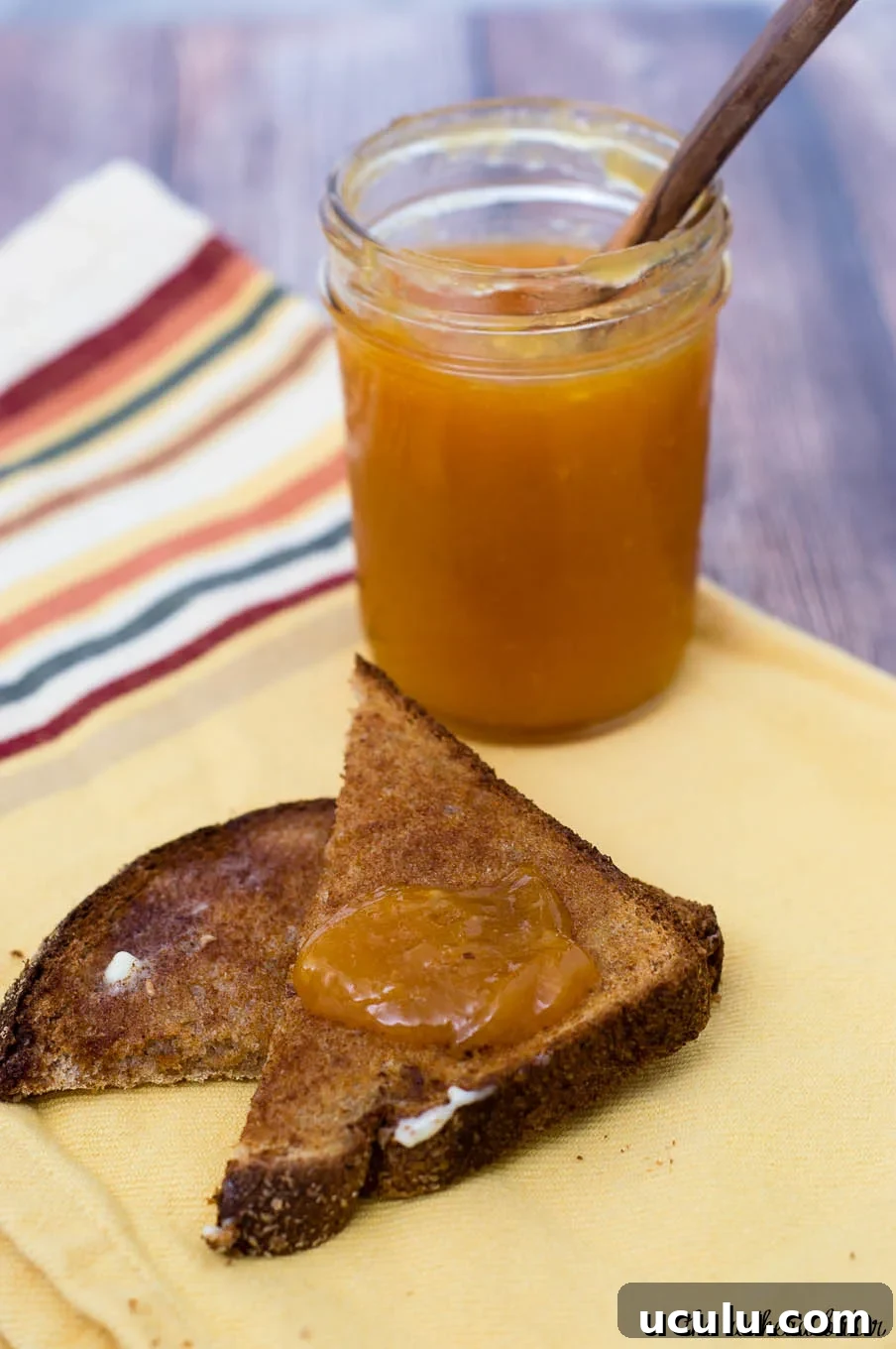 Peach butter is smoother and less sweet than peach preserves, resulting in a purer peach flavor. Canning peach butter preserves the flavor all year long. #SundaySupper
