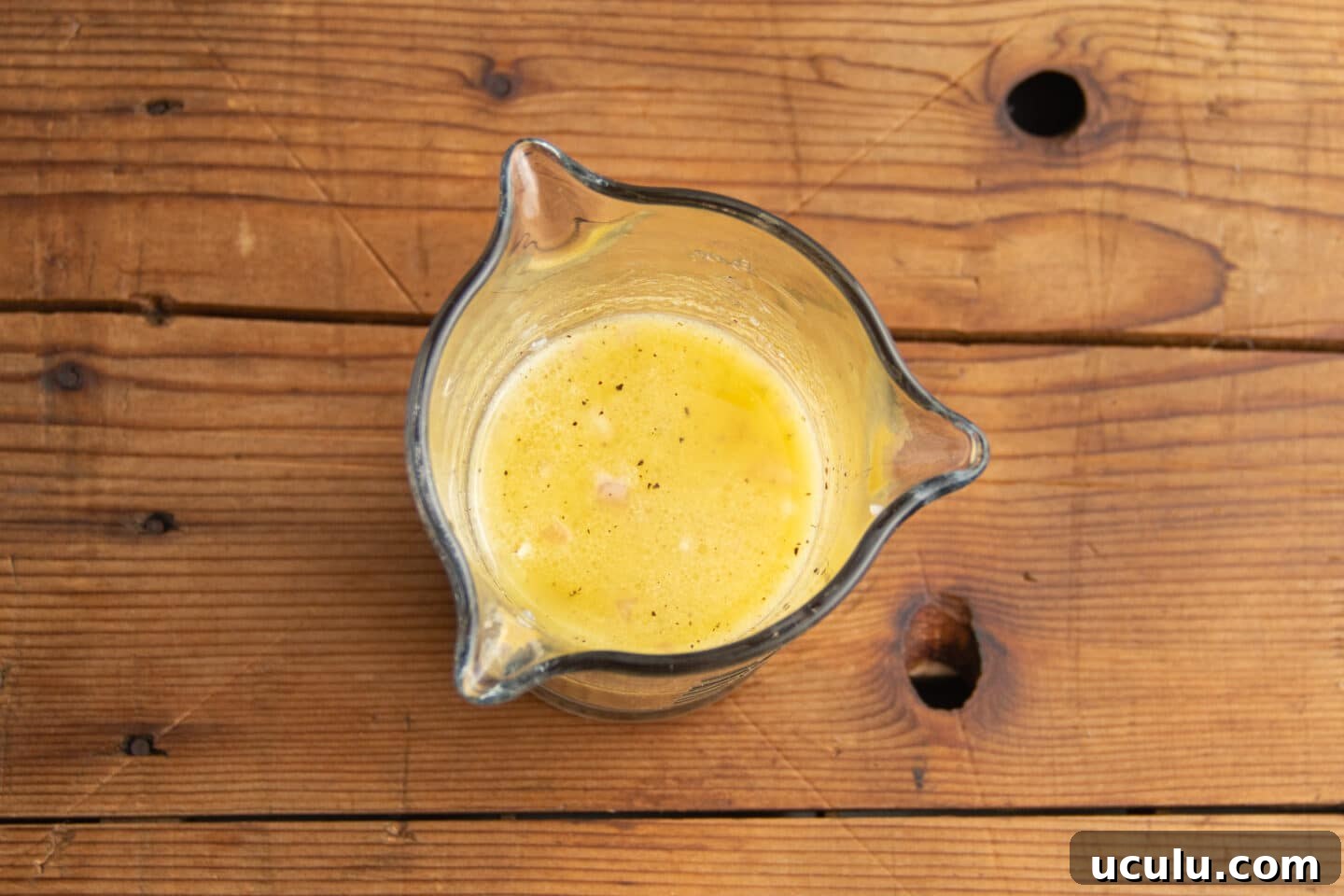 This is a picture of salad dressing whisked together.