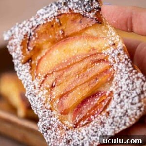Hand holding upside down pastries
