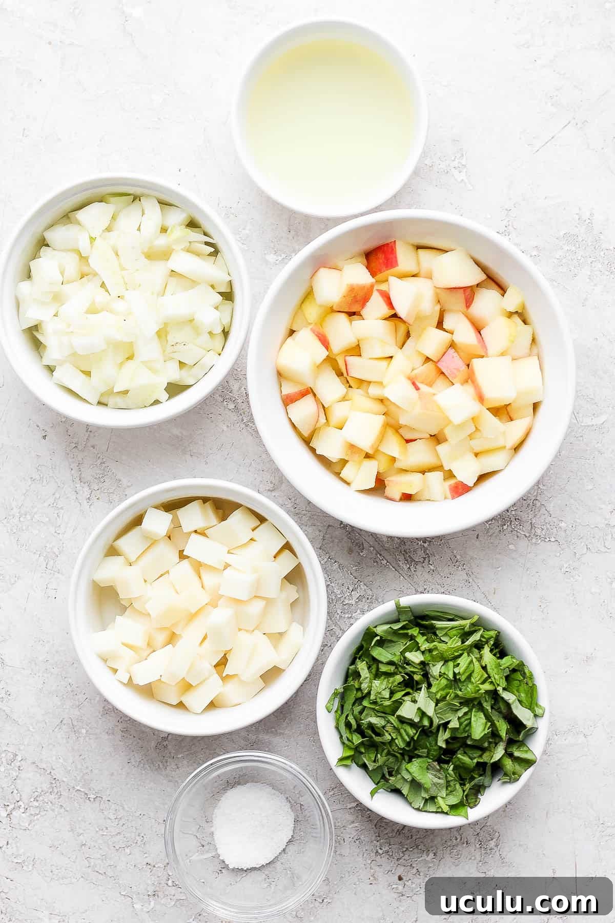 All salad ingredients in little bowls.