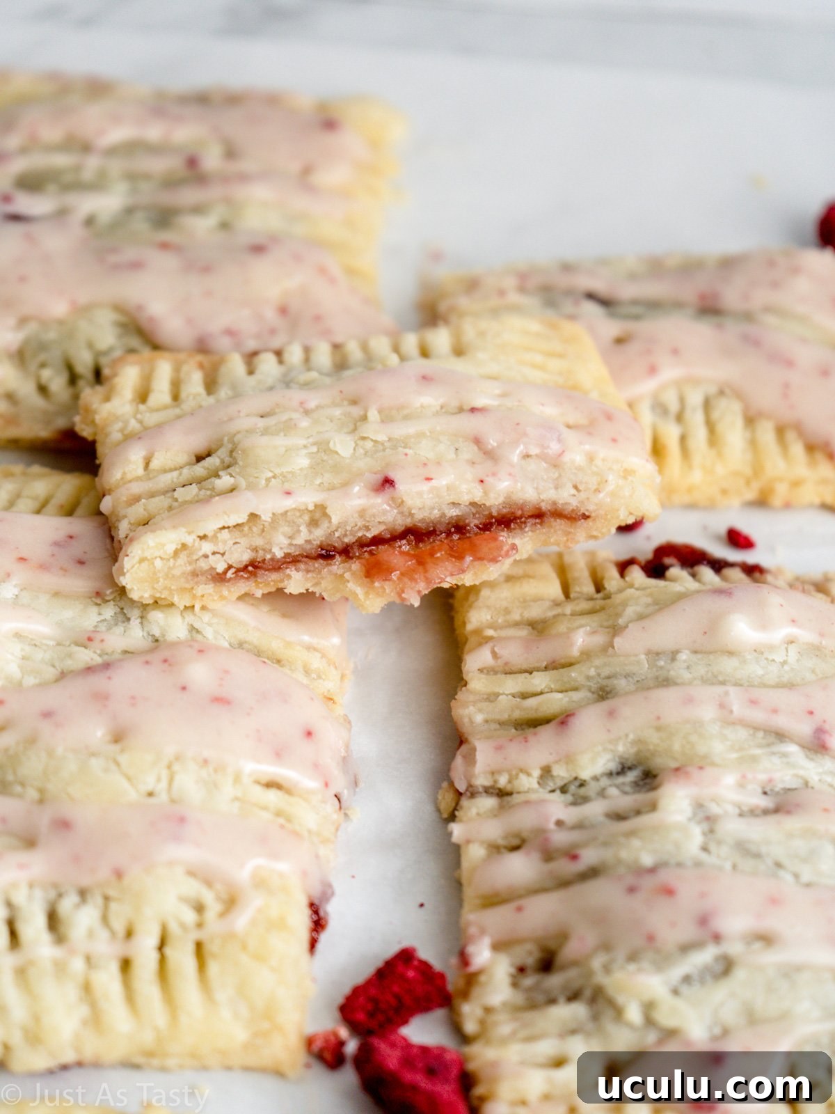 Raspberry pop tart cut in half.