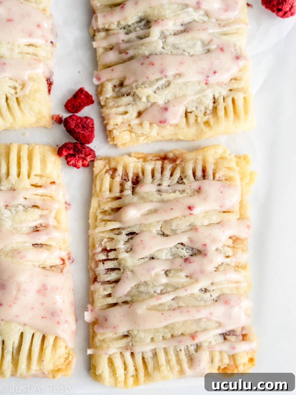Close-up of a glazed raspberry pop tart.