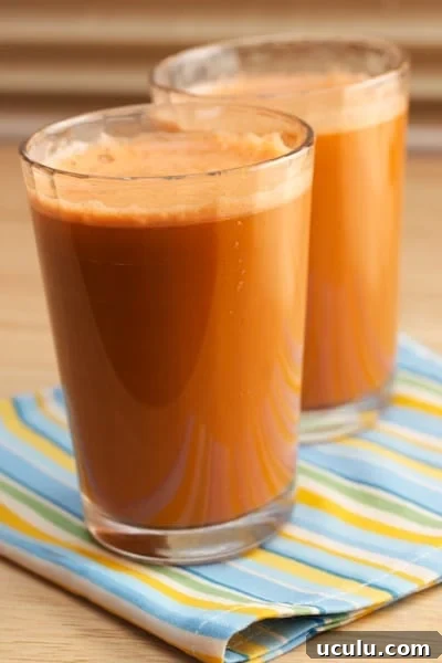 Two glasses of orange juice.