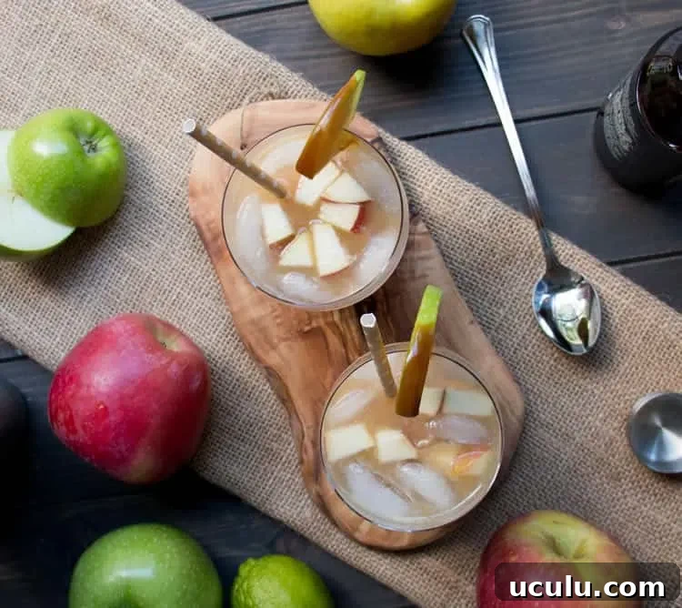 Caramel Apple Cider Cocktail. Apple Cider, caramel sauce, rum and ginger beer come together in this fall inspired cocktail. Perfect for fall gatherings.