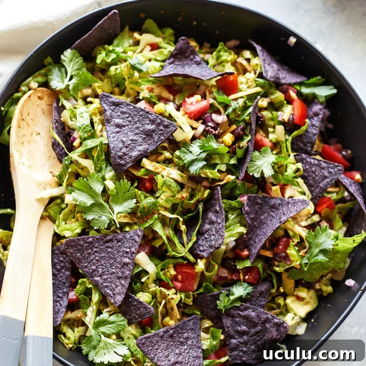 Overhead view of a veggie taco salad in a bowl