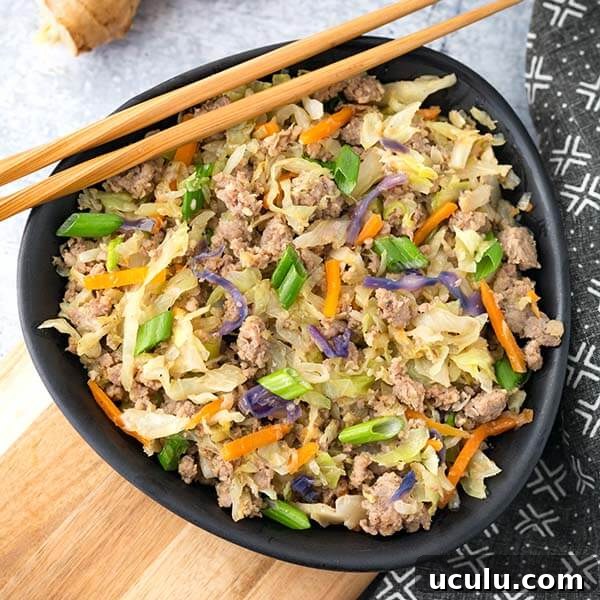 Low-Carb Instant Pot Recipes for Quick Weeknight Meals 13 egg roll in a bowl in a black bowl with bamboo chopsticks