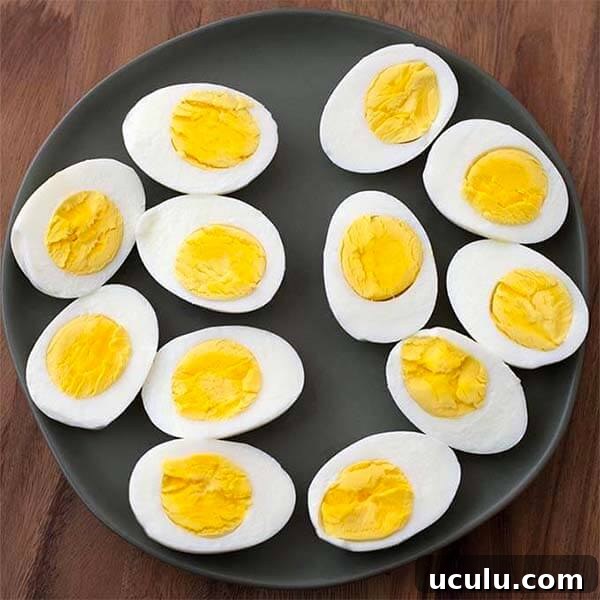 Low-Carb Instant Pot Recipes for Quick Weeknight Meals 24 several boiled eggs sliced in half on a black plate
