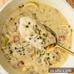 spatula lifting Chicken Scallopini from skillet