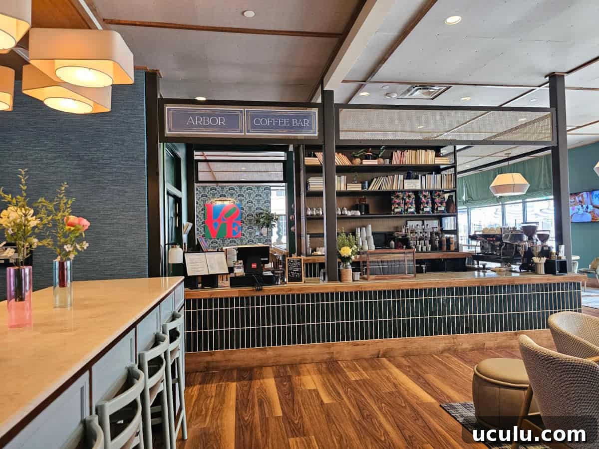 The Bradley Hotel in Fort Wayne, Indiana — Historic Tour Video 11 The Arbor Coffee Bar with long counter, LOVE Sign in the background, seating area