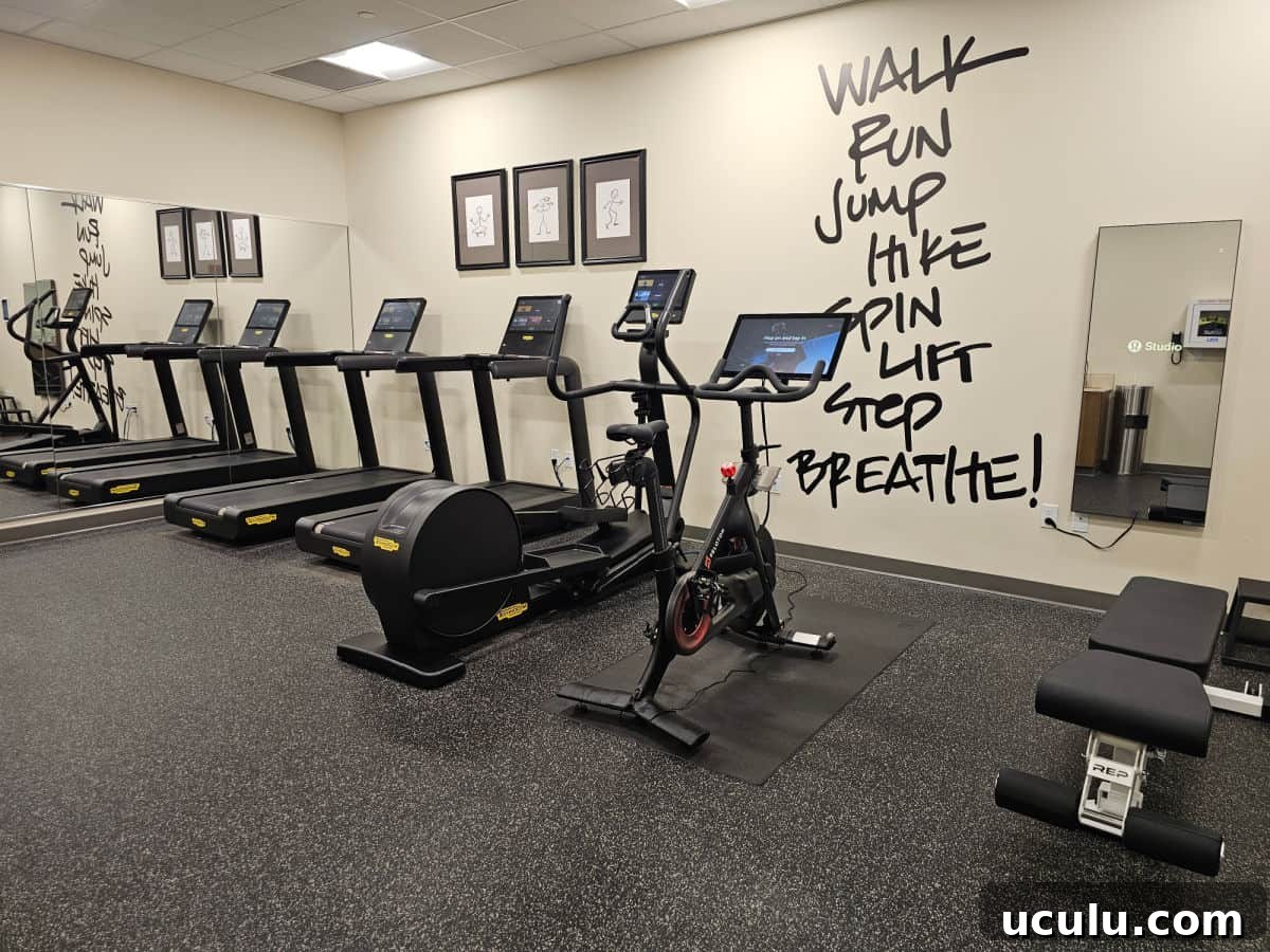 The Bradley Hotel in Fort Wayne, Indiana — Historic Tour Video 7 Fitness center with walk, run, jump, hike, life, step, breathe painted on the wall