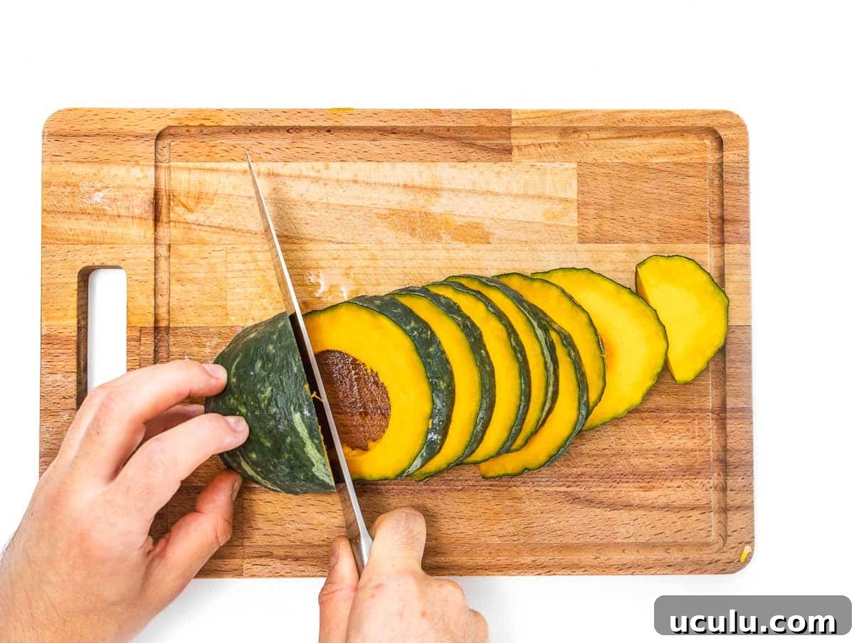 Roasted Kabocha Squash Recipe with Crispy Herb Crust 6 Acorn squash on a cutting board